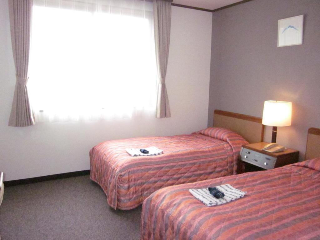Ayun Takayama Central Hotel Quarto foto