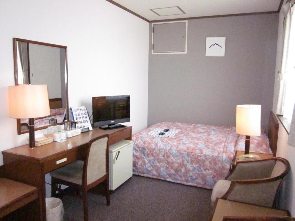 Ayun Takayama Central Hotel Quarto foto