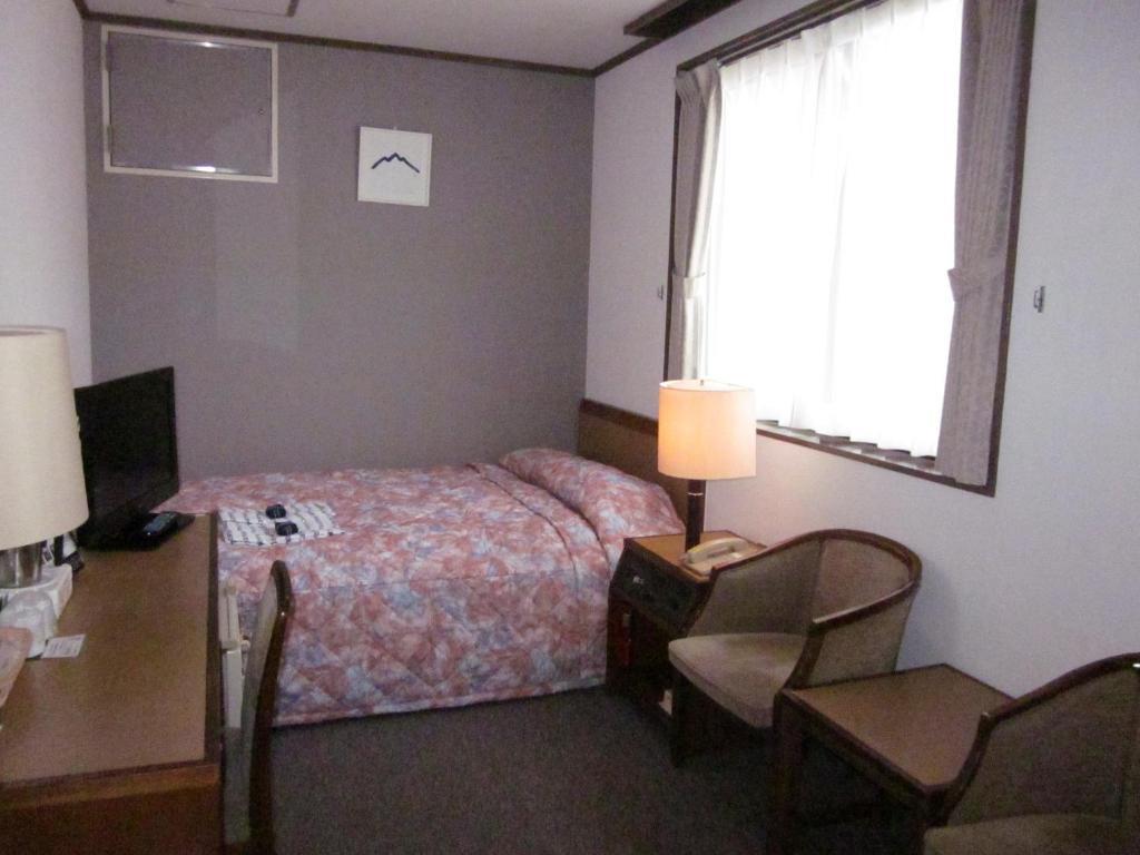 Ayun Takayama Central Hotel Quarto foto