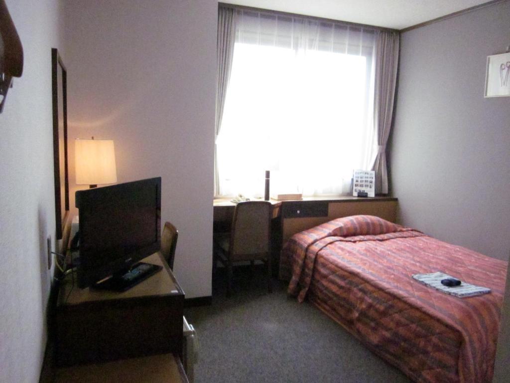 Ayun Takayama Central Hotel Quarto foto