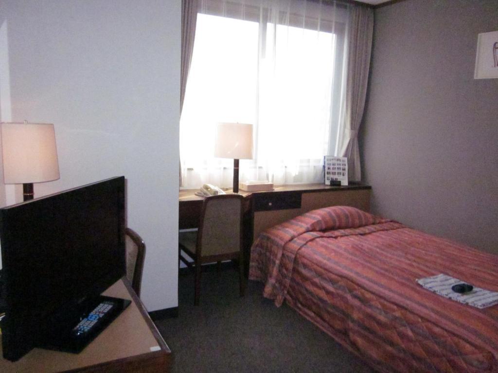 Ayun Takayama Central Hotel Quarto foto