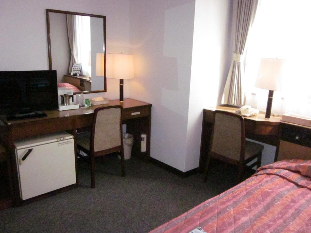 Ayun Takayama Central Hotel Quarto foto